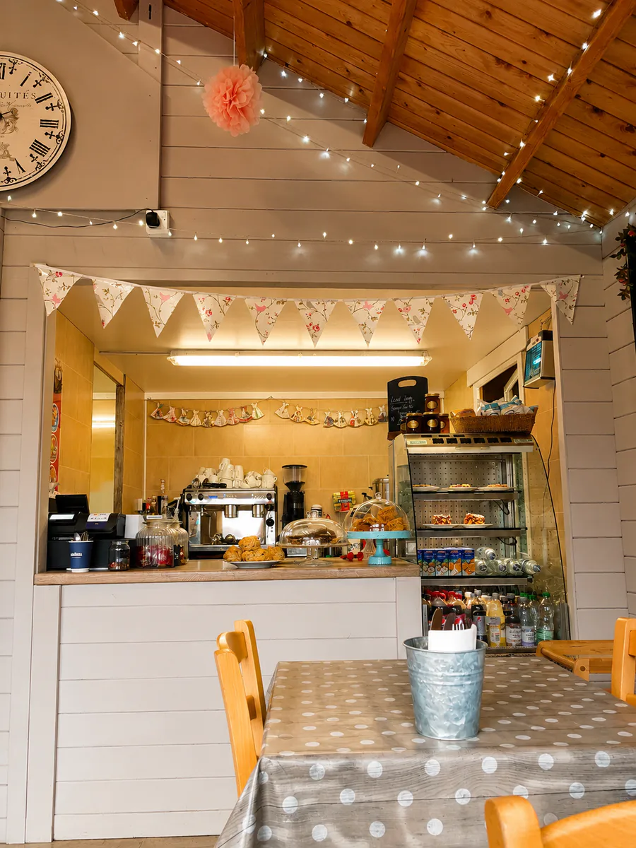 The counter and dining room inside The Pump House Tea Room